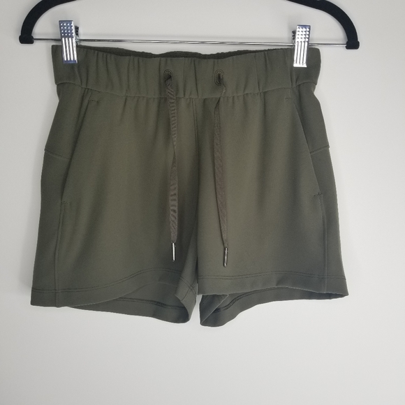 Lululemon On The Fly Short Woven Dark Olive Shorts - Picture 6 of 13
